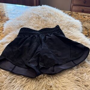 Lululemon Women’s 5” shorts. Built in liner size 4. Black camo color. Like new!